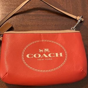 Coach horse and carriage leather medium wristlet
